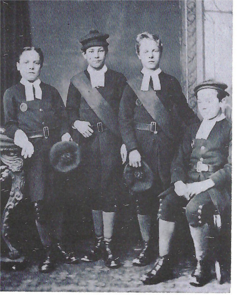 Part of the Blue House was ·used as a school from 1728 until 1921. J. Munro, of Dungarvan Buildings, photographed this smart group of senior lads about 1870